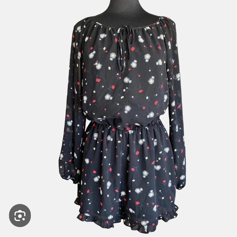 Bcbg romper. Shorts.  Sleeve is mesh like.